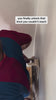 A video of someone leaning back into the Reliefboard against a wall.